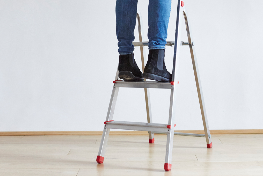 Mensch auf der Leiter