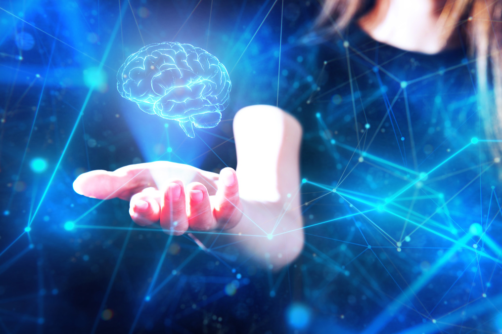 Grafik mit einer Hand und einem Gehirn